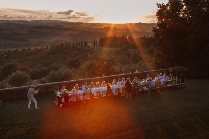 
	dinner during sunset in Tuscany
