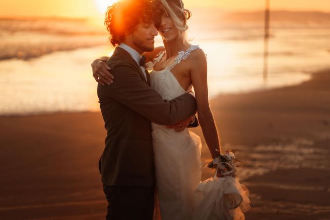 
	beach wedding during sunset
