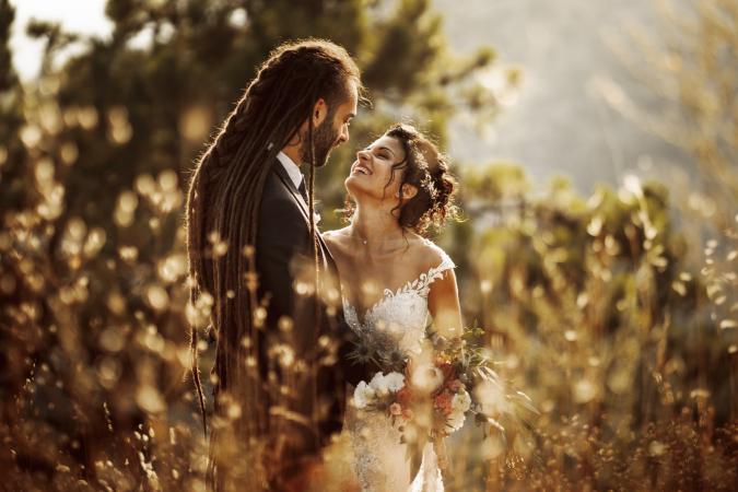 
	Bride and groom in a field

