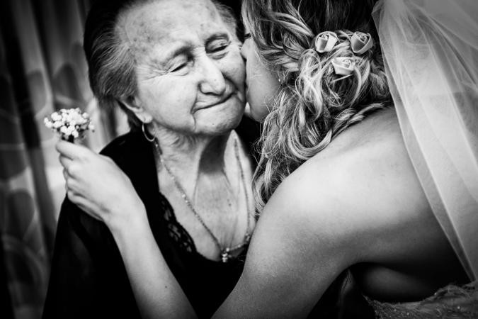 
	bride kissing her grandma
