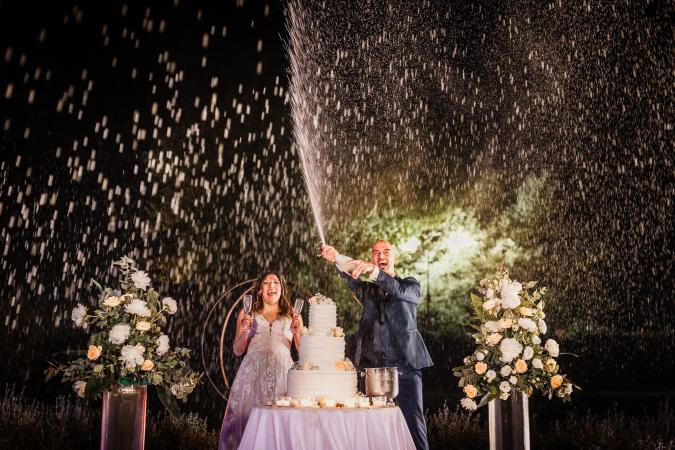 
	cake and champagne during a wedding
