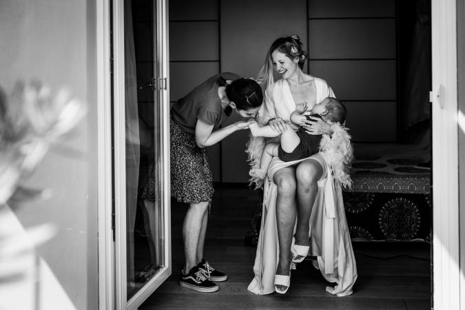 
	breastfeeding mom during wedding preparations
