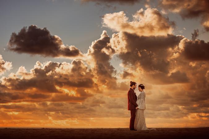 
	beach wedding during sunset
