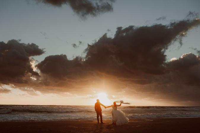 
	wedding on the beach at sunset
