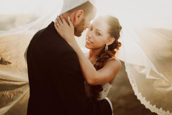 
	bride and groom at sunset
