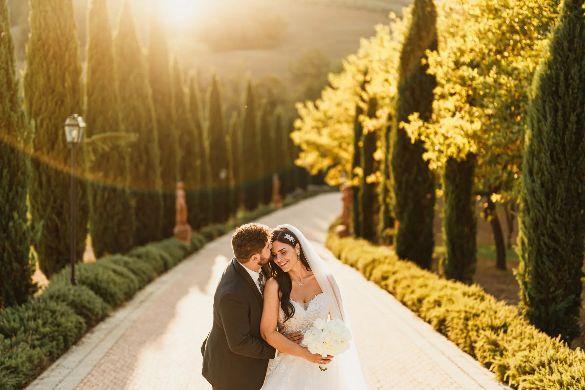 spouses during sunset at Tenuta Corbinaia